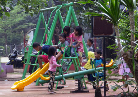 Indonesian children play in the park happilyのeditorial素材