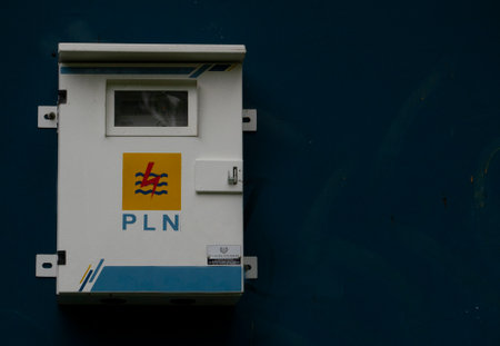KWH meter box attached to the blue wall