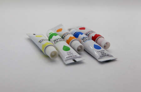 Group shot of watercolor stacks on white backgroundの写真素材
