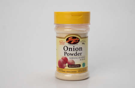 Jakarta, Indonesia-August 1, 2021: Bottle of Onion Powder isolated white background, copy spaceのeditorial素材