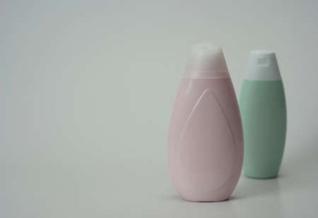 Set of hand soap bottles on a white background.