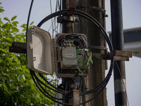 electricity post with wires and cables in the city, Thailand.の写真素材