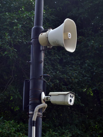 Megaphone on a pole in the park.の写真素材