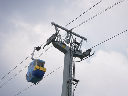 Cable car on blue sky background.の写真素材