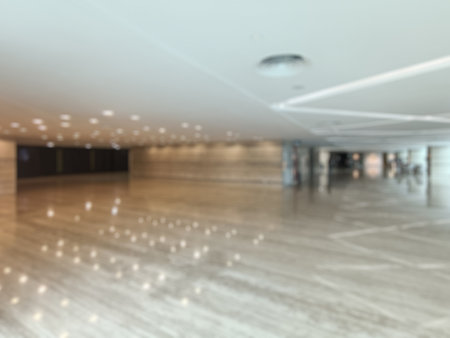 Blurred image of interior of modern office building for background usage.