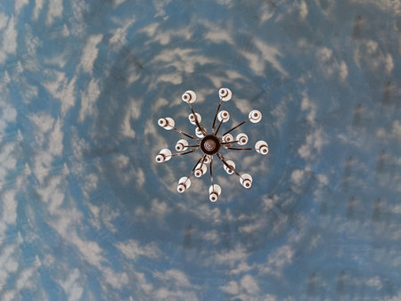 Chandelier on a blue background. Top view.