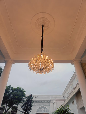 Luxury chandelier on the ceiling of the building.の写真素材
