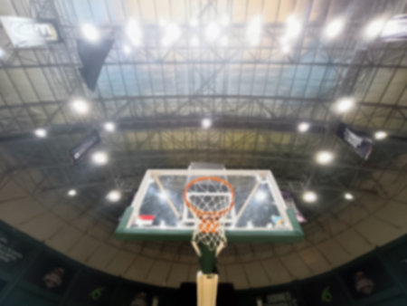 Basketball sport background, Blur of basketball court in sport arena