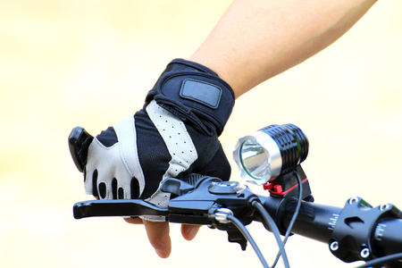 wear gloves while riding a mountain biking for safetyの写真素材