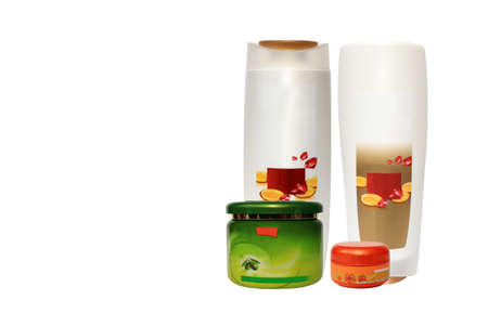 Collection of cream and lotion containers on white backgroundの写真素材