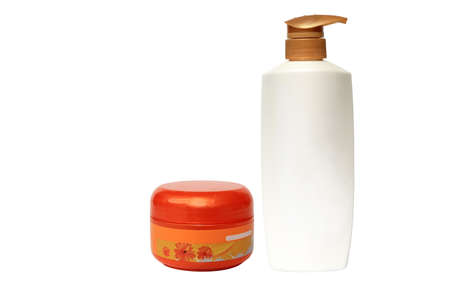 Collection of cream and lotion containers on white backgroundの写真素材