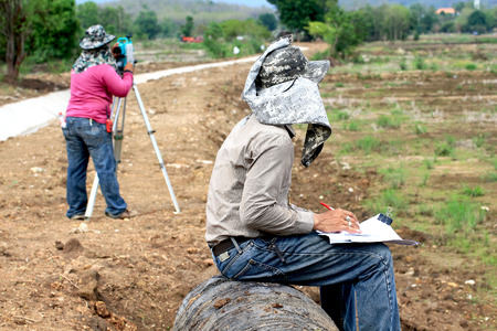 People are working surveying landの写真素材