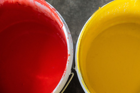 Close-up view of paint can on concrete floorの写真素材