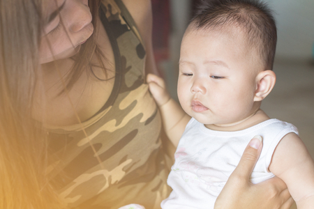 Cute Baby and Mother Happy Familyの写真素材