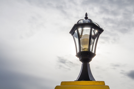 ligth lamp,LED light post on the fence,temple estate,beauty model
の写真素材