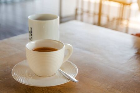 Coffee brake set,cups of coffee espresso with spoons on the table
の写真素材