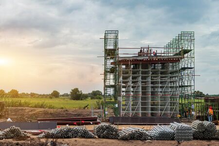 Construction site of the expessway pillar and scaffolding for stucture ,The infrastructure pole of...