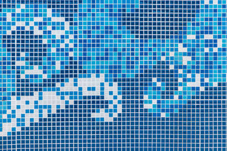 Detail of beautiful old collapsing abstract ceramic mosaic adorned building decorative background,Abstract Pattern,Abstract mosaic colored ceramic stonesの写真素材