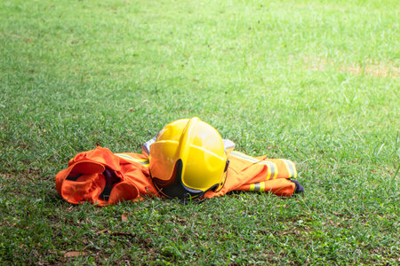 Firefighters tools helmet on floor for fire fighting training, accessories and equipment for fire fightingの写真素材