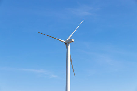 Wind turbines farm on mountanis landscape at Lam Takong Reservoir Views against blue sky with clouds background,Windmills for electric power ecology conceptの写真素材