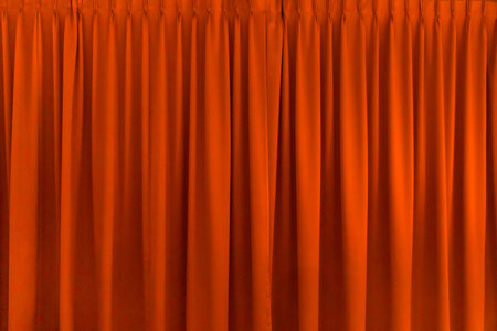 Smooth elegant red curtain from silk or satin luxury cloth texture can to be background. Luxurious Christmas background or New Year background.の写真素材