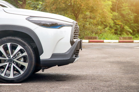 A front view of a car scene behind a parking lot in a tourist destination.の写真素材