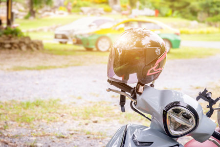 A helmet on a sport bike looks out to prepare for a touring ride. driving safetyの写真素材