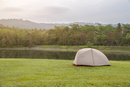 Beautiful tents set up in beautiful nature. Among the trees and green lawns For relaxing holidays and eco-tourism.の写真素材