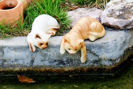Cat statue was placed next to the pools.の写真素材