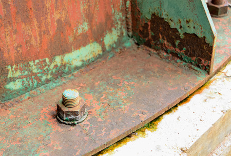 Nut and bolt is a device used to hold items of different types or the same type together.の写真素材