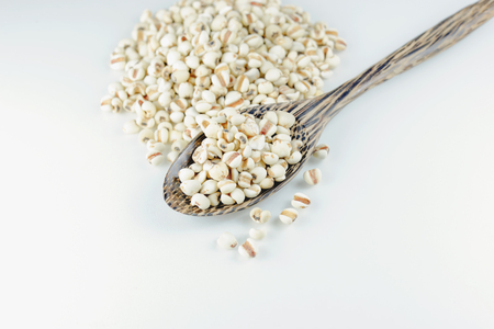 Millet part was placed in a wooden spoonの写真素材