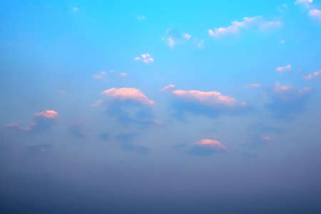 The evening sky above the light is over on top of the earth.
