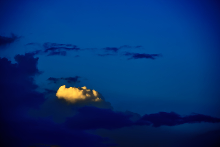 The white clouds clearly visible in the blue sky.