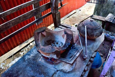 In the past, cooking heat required equipment to avoid direct contact with heat.の写真素材