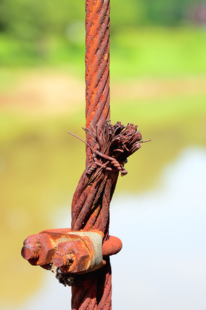 The U-bolt was used to hold the rope for a long time, and the rusting was normal.の写真素材