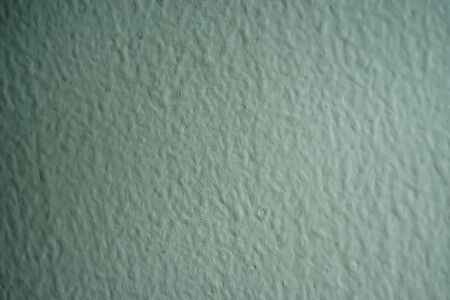 The plaster walls that have been painted with air bubbles when the paint is dry will cause a hole in the position that has bubbles at that area.の写真素材