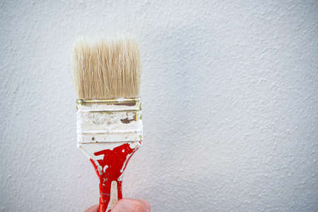 Old paint brushes that have been used but have been cleaned so they can be reused for the next time.の写真素材