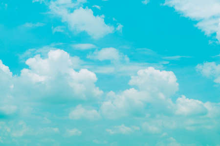 blue green sky background with white cloudの写真素材