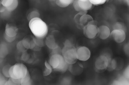 Black bokeh texture on black backgroundの写真素材