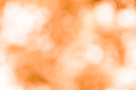 Abstract orange bokeh backgroundの写真素材