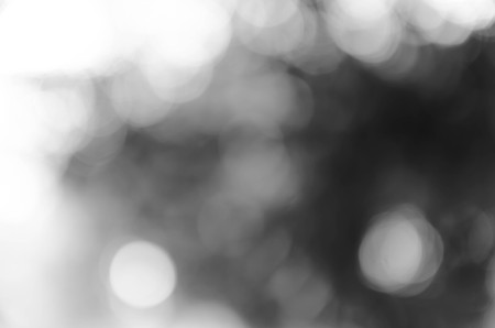 Black bokeh texture on black backgroundの写真素材