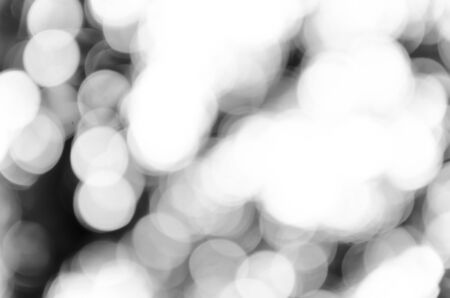 Black bokeh texture on black backgroundの写真素材