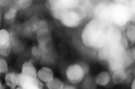 Black bokeh texture on black backgroundの写真素材