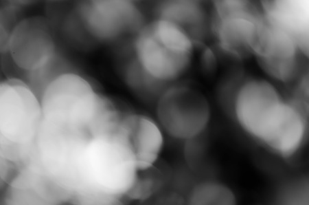 Black bokeh texture on black backgroundの写真素材
