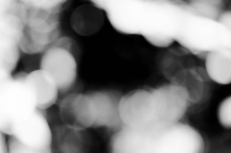 Black bokeh texture on black backgroundの写真素材
