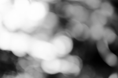 Black bokeh texture on black backgroundの写真素材
