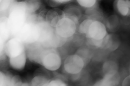 Black bokeh texture on black backgroundの写真素材