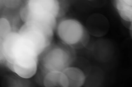 Black bokeh texture on black backgroundの写真素材