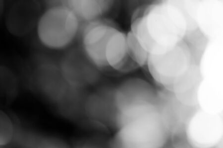Black bokeh texture on black backgroundの写真素材