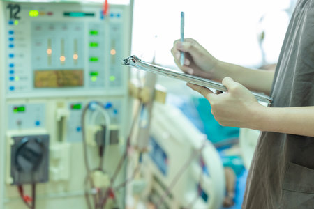 The specialist are checking continuous renal replacement therapy equipment and injection pump and hemodialysis machine.の写真素材